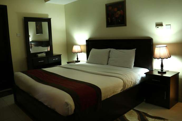Imagen de la habitación del Hotel OYO 150 Al Usra Furnished Apartments. Foto 10