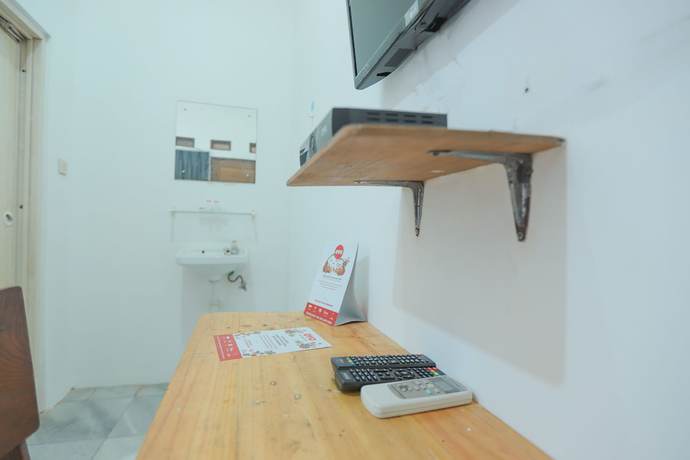 Imagen de la habitación del Hotel OYO 150 Harmoni Residence. Foto 2