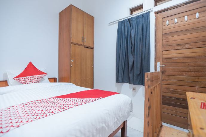 Imagen de la habitación del Hotel OYO 150 Harmoni Residence. Foto 4