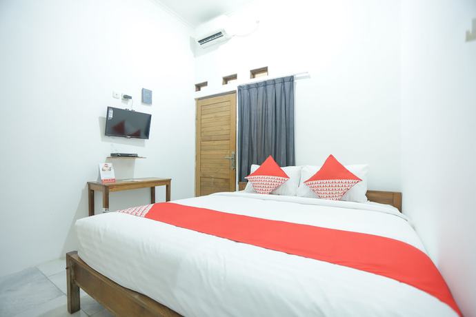 Imagen de la habitación del Hotel OYO 150 Harmoni Residence. Foto 6