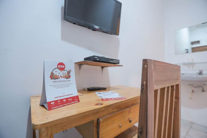Imagen de la habitación del Hotel OYO 150 Harmoni Residence. Foto 8