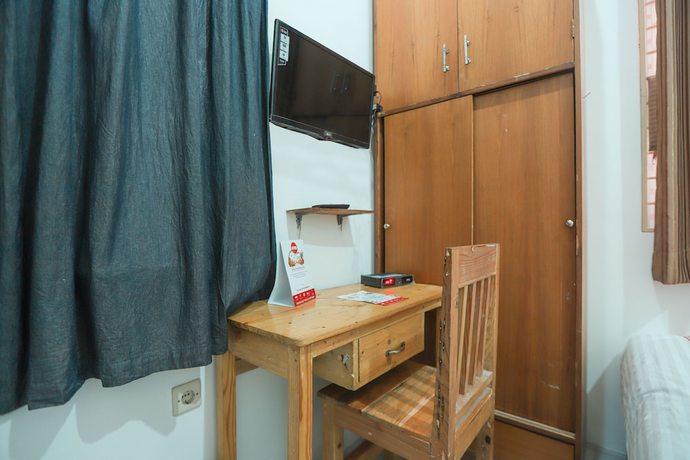 Imagen de la habitación del Hotel OYO 150 Harmoni Residence. Foto 9