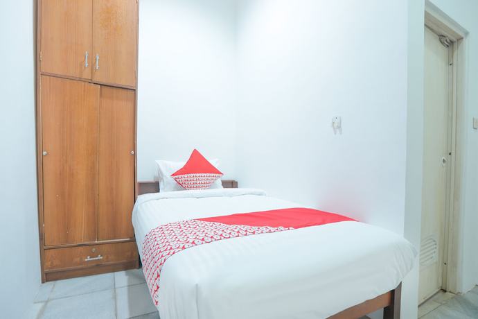 Imagen de la habitación del Hotel OYO 150 Harmoni Residence. Foto 10