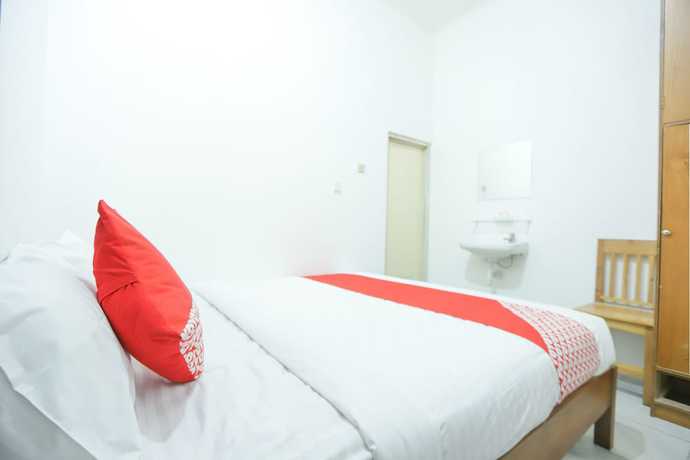 Imagen de la habitación del Hotel OYO 150 Harmoni Residence. Foto 12