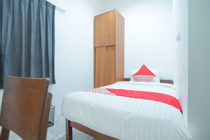 Imagen de la habitación del Hotel OYO 150 Harmoni Residence. Foto 14