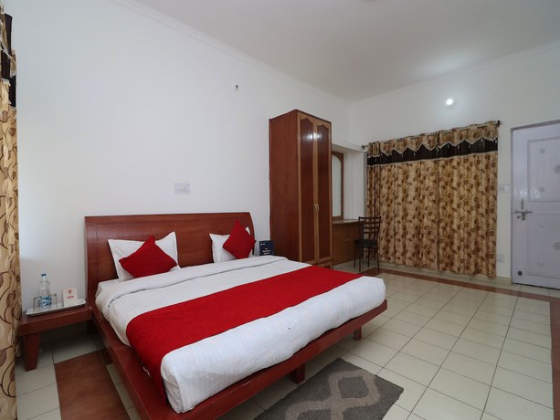 Imagen de la habitación del Hotel OYO 15022 Snow Point Inn. Foto 13