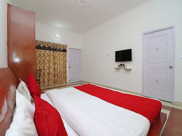 Imagen de la habitación del Hotel OYO 15022 Snow Point Inn. Foto 14