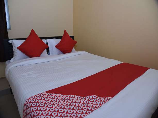 Imagen de la habitación del Hotel OYO 15071 Harsh Raj Residency. Foto 7
