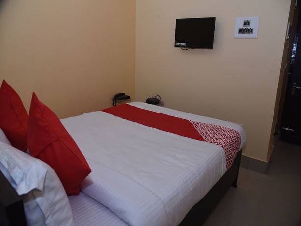 Imagen de la habitación del Hotel OYO 15071 Harsh Raj Residency. Foto 8