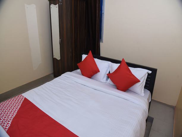 Imagen de la habitación del Hotel OYO 15071 Harsh Raj Residency. Foto 9