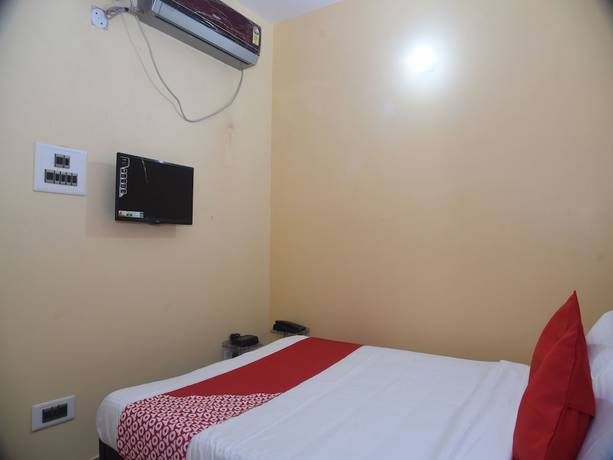 Imagen de la habitación del Hotel OYO 15071 Harsh Raj Residency. Foto 15