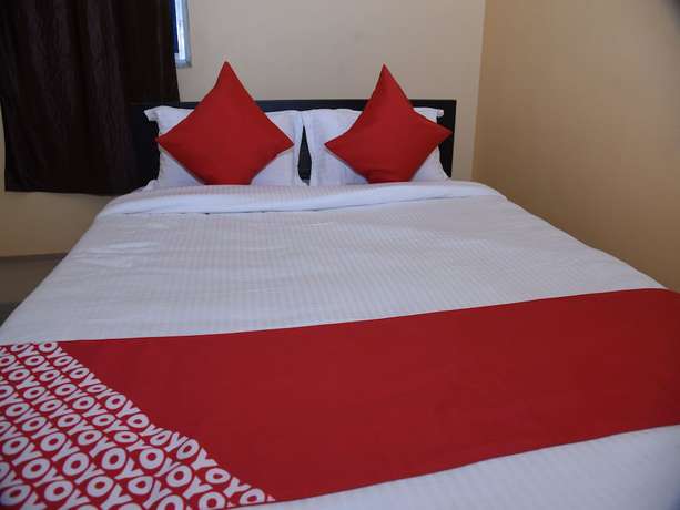 Imagen de la habitación del Hotel OYO 15071 Harsh Raj Residency. Foto 17