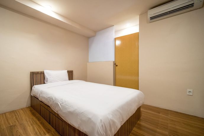 Imagen de la habitación del Hotel OYO 1512 Harley. Foto 4