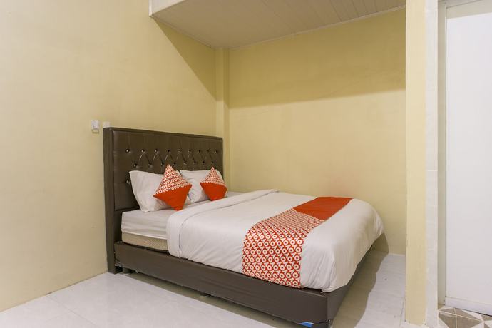 Imagen de la habitación del Hotel OYO 1512 Harley. Foto 6
