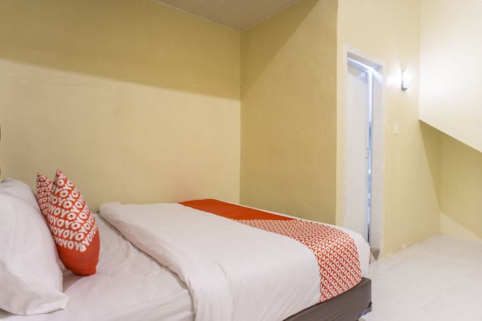 Imagen de la habitación del Hotel OYO 1512 Harley. Foto 7