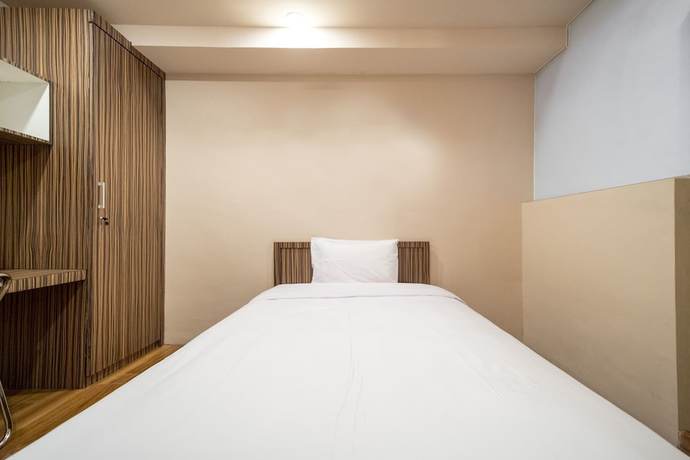 Imagen de la habitación del Hotel OYO 1512 Harley. Foto 8