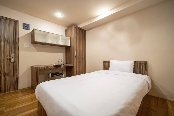 Imagen de la habitación del Hotel OYO 1512 Harley. Foto 9