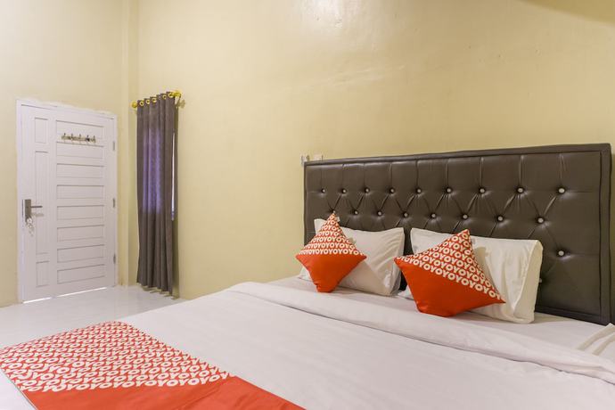 Imagen de la habitación del Hotel OYO 1512 Harley. Foto 10