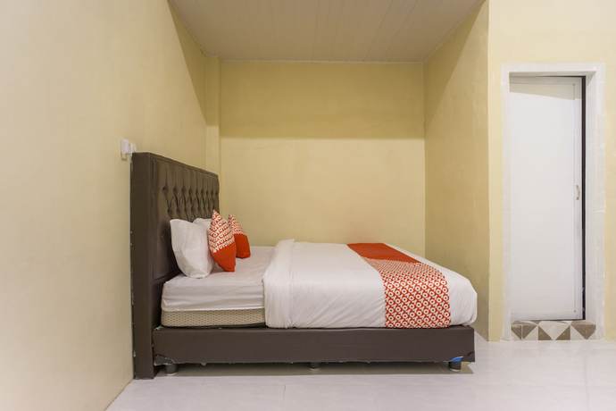 Imagen de la habitación del Hotel OYO 1512 Harley. Foto 14