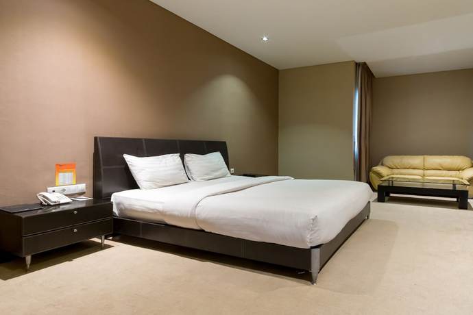 Imagen de la habitación del Hotel OYO 1512 Harley. Foto 16
