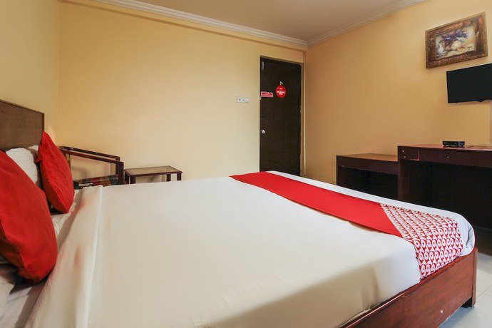 Imagen de la habitación del Hotel OYO 15140 Priya Residency. Foto 4