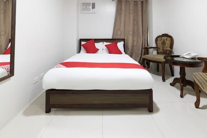 Imagen de la habitación del Hotel OYO 152 Sangco Condotel. Foto 8