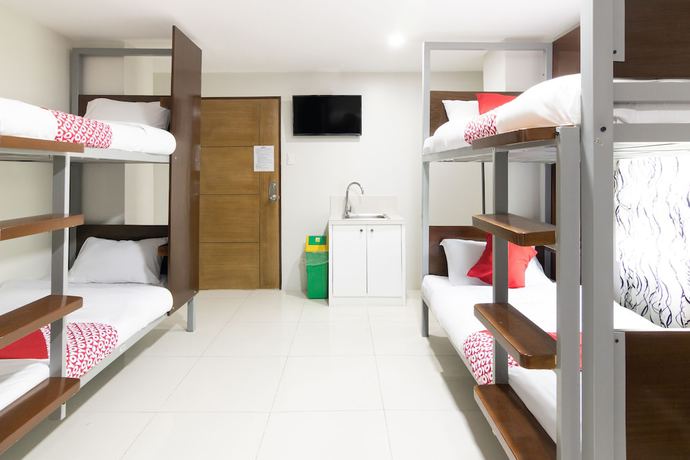Imagen de la habitación del Hotel OYO 152 Sangco Condotel. Foto 12
