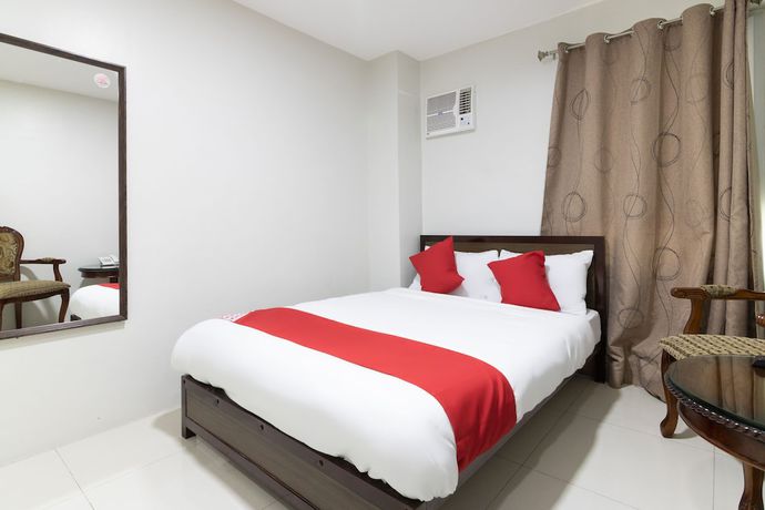 Imagen de la habitación del Hotel OYO 152 Sangco Condotel. Foto 15