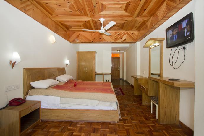 Imagen de la habitación del Hotel OYO 1537 Highland. Foto 15