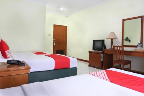 Imagen de la habitación del Hotel OYO 154 Griya Patria Guest House. Foto 7