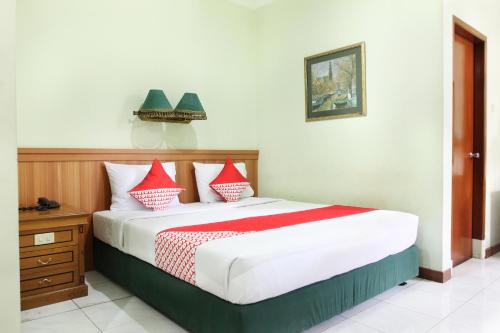 Imagen de la habitación del Hotel OYO 154 Griya Patria Guest House. Foto 8
