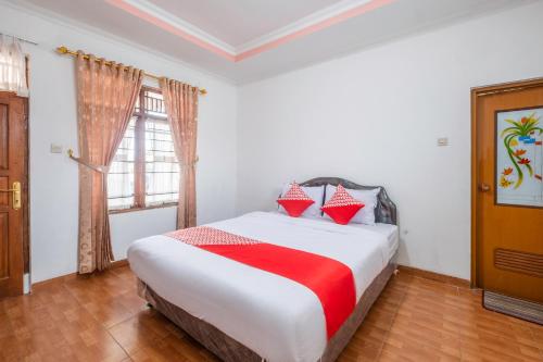 Imagen de la habitación del Hotel OYO 1541 Puri Cikole Asri. Foto 20