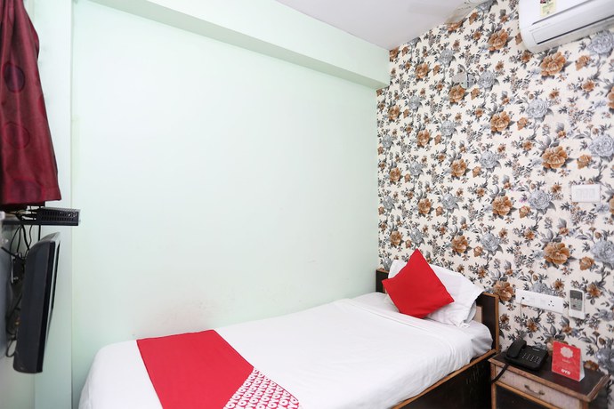 Imagen de la habitación del Hotel OYO 15443 Mega Palace. Foto 7