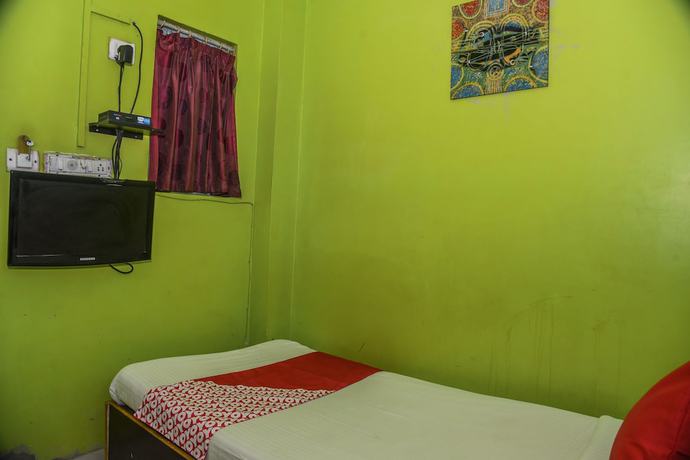 Imagen de la habitación del Hotel OYO 15443 Mega Palace. Foto 11