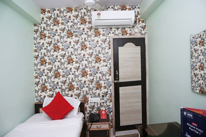 Imagen de la habitación del Hotel OYO 15443 Mega Palace. Foto 13