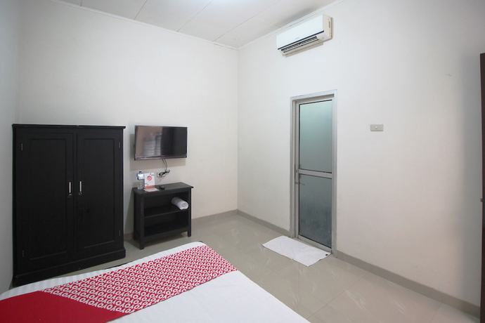Imagen de la habitación del Hotel OYO 1547 Wisma Ray Syariah. Foto 7