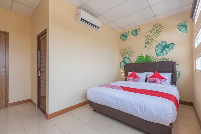 Imagen de la habitación del Hotel OYO 1552 Iodium Residence. Foto 3