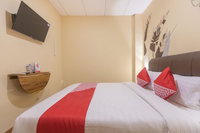 Imagen de la habitación del Hotel OYO 1552 Iodium Residence. Foto 4