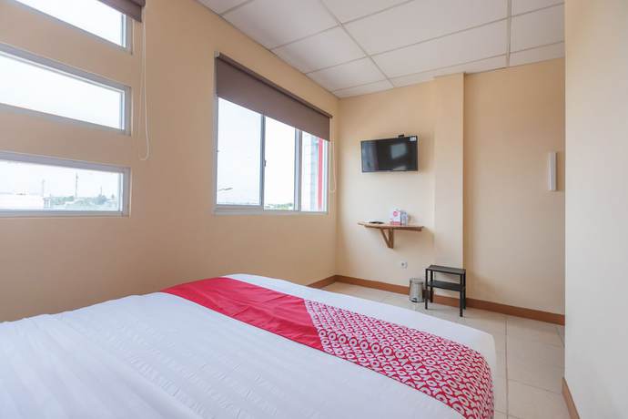 Imagen de la habitación del Hotel OYO 1552 Iodium Residence. Foto 5