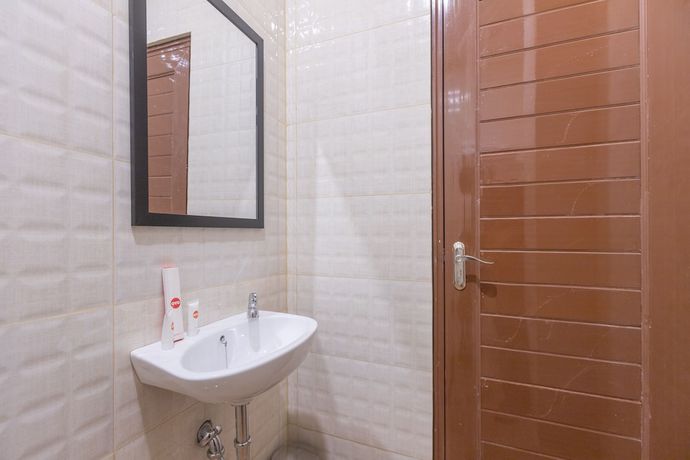 Imagen de la habitación del Hotel OYO 1552 Iodium Residence. Foto 6