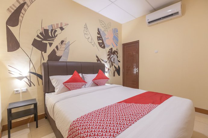 Imagen de la habitación del Hotel OYO 1552 Iodium Residence. Foto 10