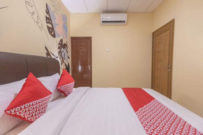Imagen de la habitación del Hotel OYO 1552 Iodium Residence. Foto 14