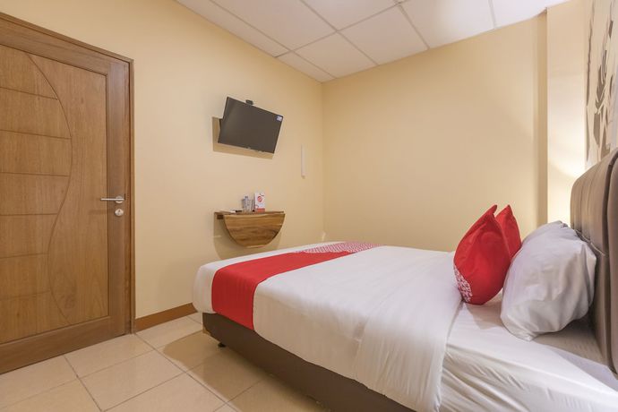Imagen de la habitación del Hotel OYO 1552 Iodium Residence. Foto 15