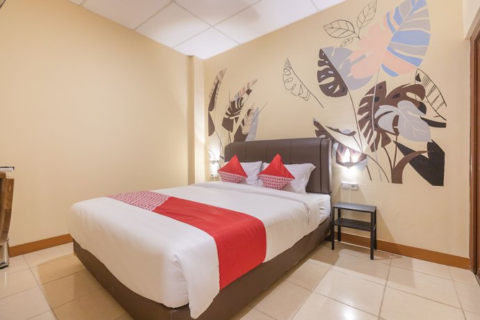 Imagen de la habitación del Hotel OYO 1552 Iodium Residence. Foto 16