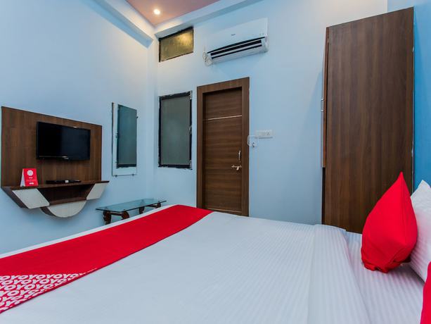 Imagen de la habitación del Hotel OYO 15569 Manorama Palace. Foto 4