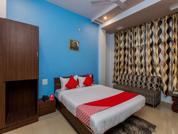 Imagen de la habitación del Hotel OYO 15569 Manorama Palace. Foto 6