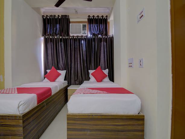 Imagen de la habitación del Hotel OYO 15589 Kamdhenu. Foto 11