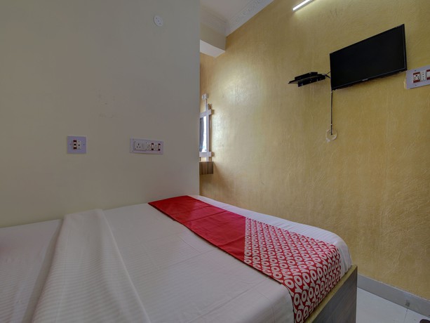 Imagen de la habitación del Hotel OYO 15589 Kamdhenu. Foto 14