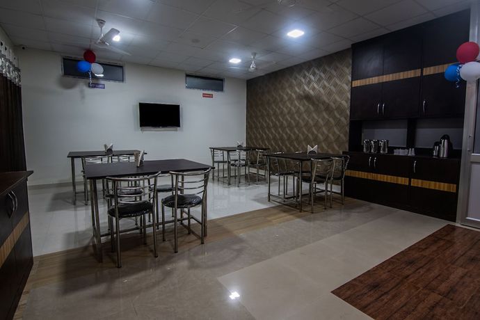 Imagen del bar/restaurante del Hotel OYO 15700 Spectrum Residency. Foto 2