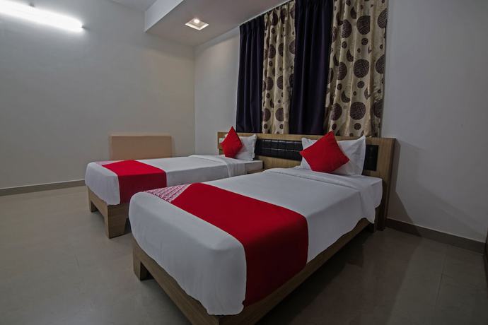 Imagen de la habitación del Hotel OYO 15700 Spectrum Residency. Foto 14